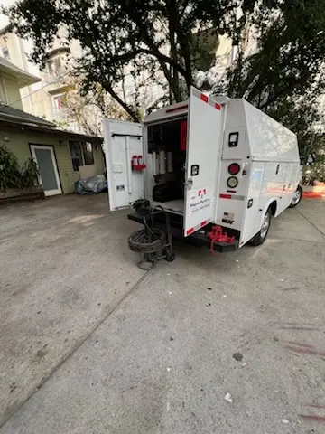 Magnet Plumbing service vehicle on-site for Grease Trap Cleaning in Hallandale Beach